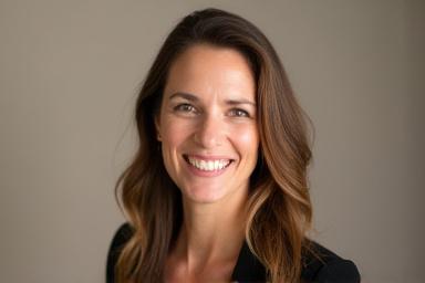 Professional headshot of Sarah Jenkins, a kind woman with warm eyes and a gentle smile.